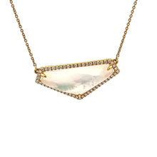 This beautiful 18k yellow gold pendant features clear quartz/opal i...