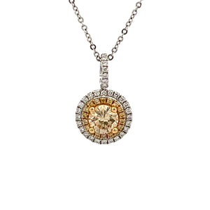 This 18k white/yellow gold necklace features a champagne diamond th...