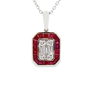This beautiful 14k white gold necklace features rubies totaling app...