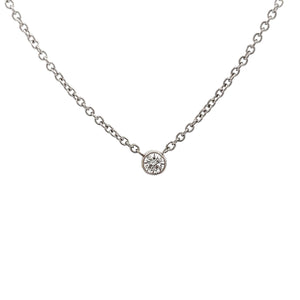 This classic bezel-set pendant is made in 14k white gold features a...