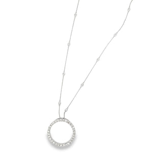 A circle pendant on a 14k white gold chain features 30 round brilli...