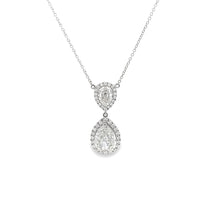 This beautiful 18k white gold pendant features 2 pear shaped diamon...