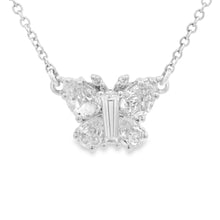 This gorgeous 14k white gold butterfly necklace by Christopher Desi...