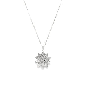This 18k white gold diamond necklace features a beautiful flower pe...