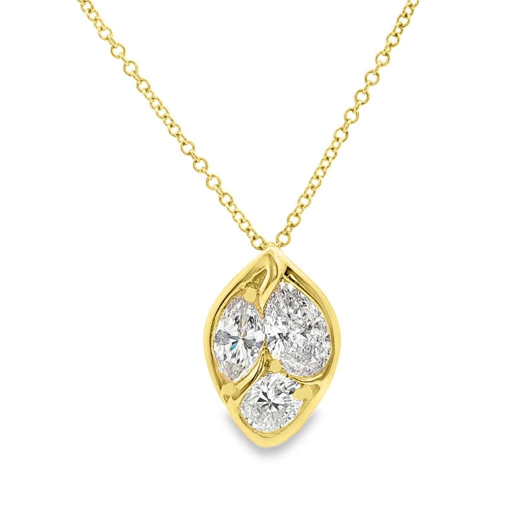 This beautiful 18k yellow gold pendant features 3 different diamond...