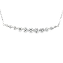 This 14k white gold diamond bar necklace features 11 round brillian...