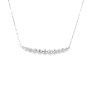 This 14k white gold diamond bar necklace features 11 round brillian...