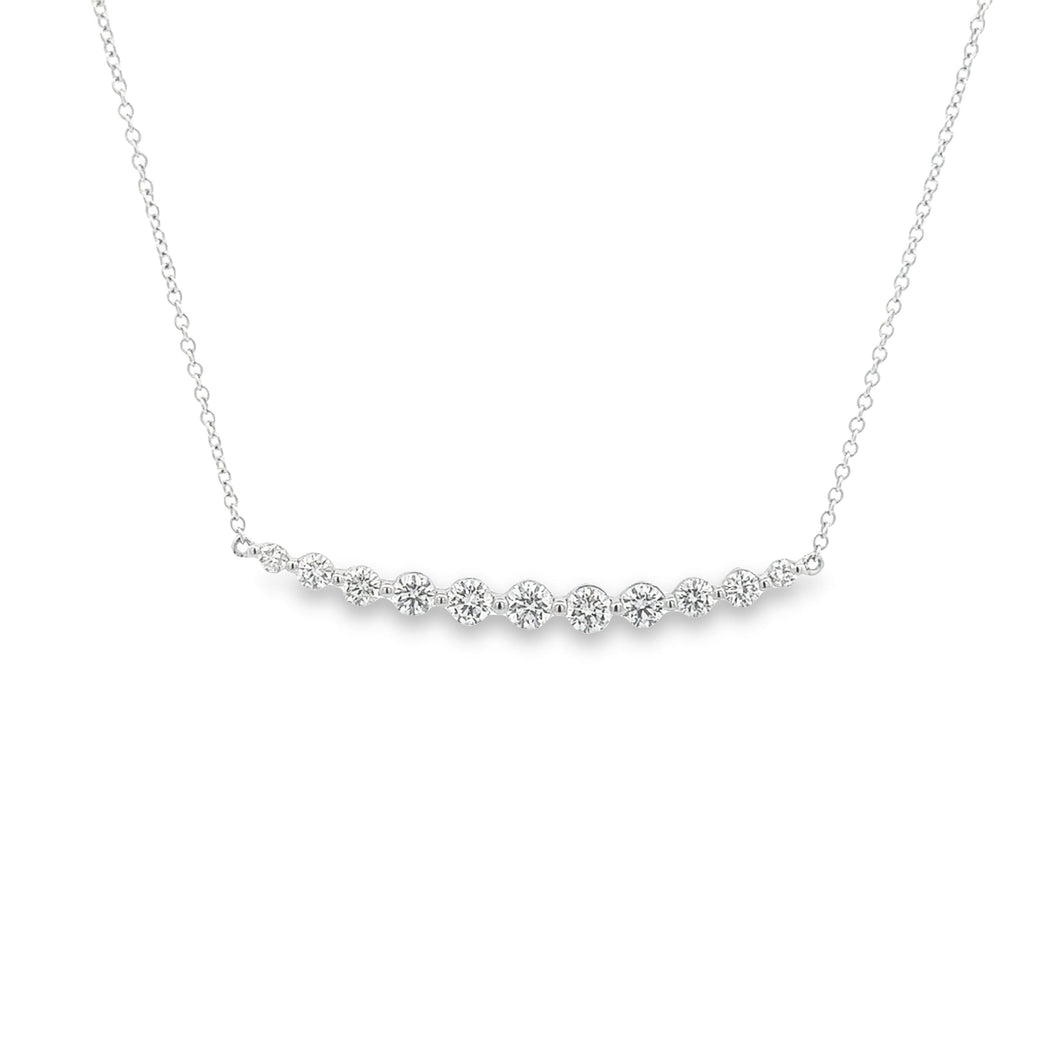 This 14k white gold diamond bar necklace features 11 round brillian...