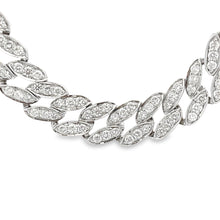 This beautiful 18k white gold necklace features round brilliant cut...