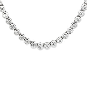 This beautiful 14k white gold necklace features round brilliant cut...