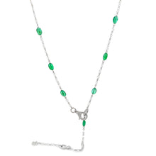 This stunning 18k white gold necklace features diamonds totaling ap...