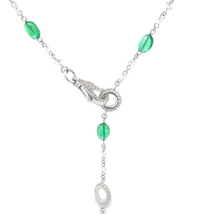 This stunning 18k white gold necklace features diamonds totaling ap...