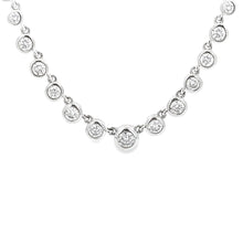 This 14k white gold necklace features 23 round brilliant cut diamon...