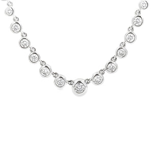 This 14k white gold necklace features 23 round brilliant cut diamon...