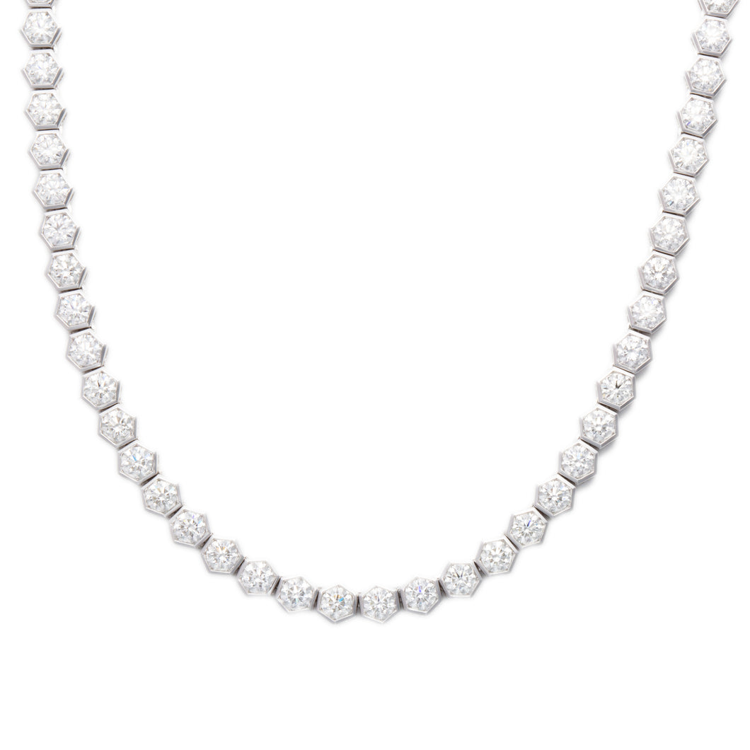 This stunning 18k white gold necklace features 94 round brilliant c...