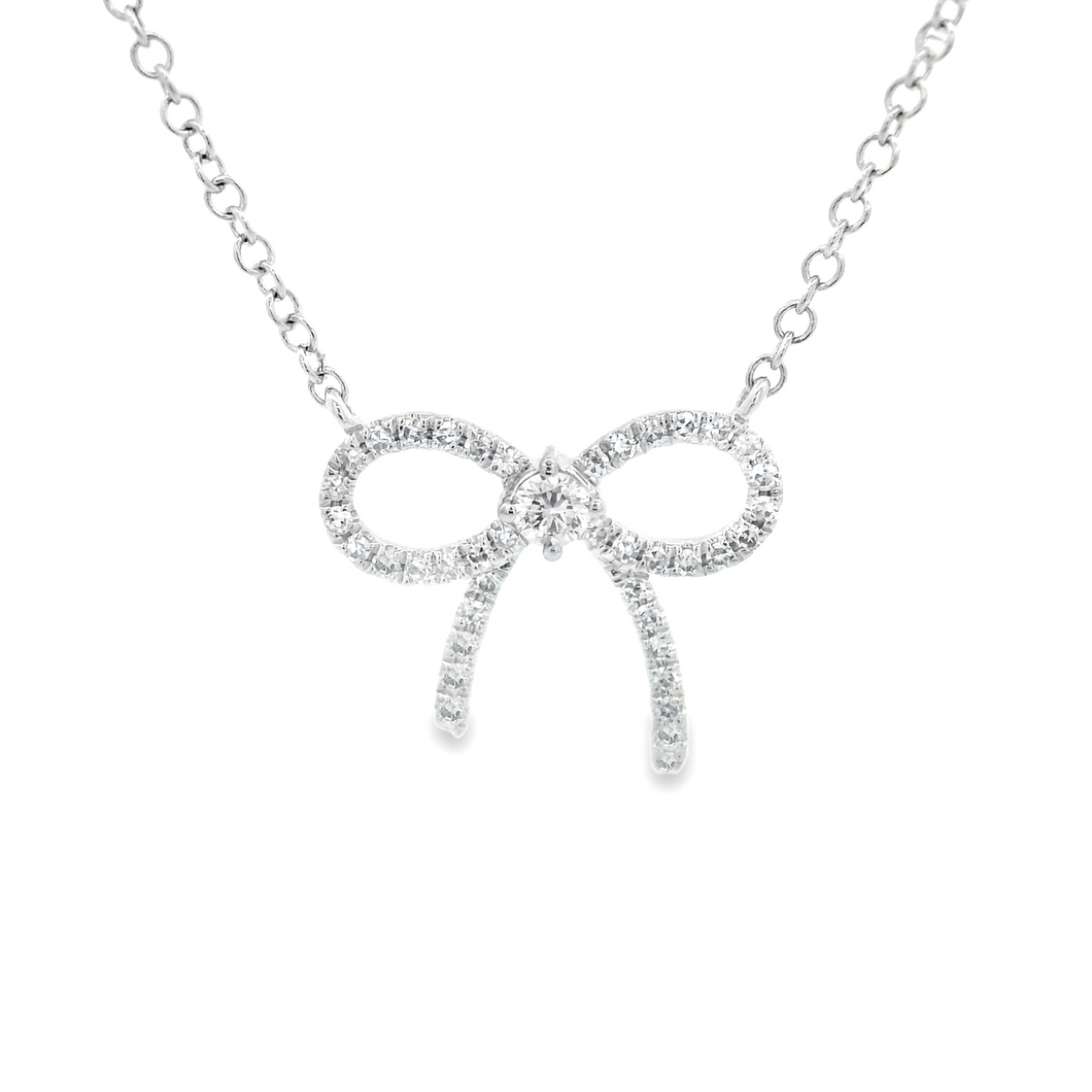 This sweet and dainty 14k white gold necklace features pave-set rou...