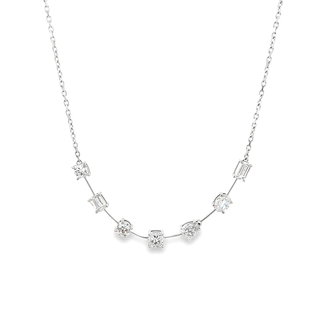 This gorgeous 14k white gold necklace features 7 diamonds in variou...