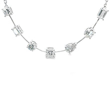 This gorgeous 14k white gold necklace features 7 diamonds in variou...