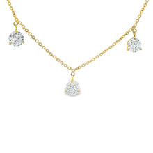 This beautiful 18k yellow gold necklace features 9 round brilliant ...