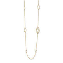 This yellow gold diamond necklace features pave set round brilliant...