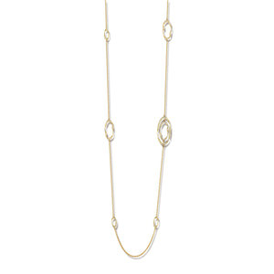 This yellow gold diamond necklace features pave set round brilliant...