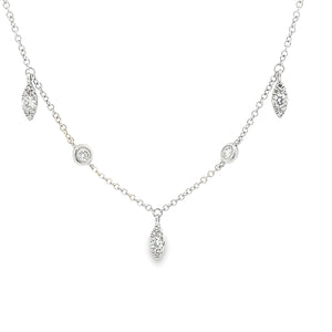 This 14k white gold diamond necklace features round brilliant cut d...