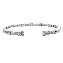 Estate piece: 18k white gold diamond cuff bracelet. 
Diamonds: 168 ...