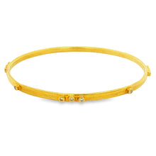 18k Yellow Gold Diamond Bangle.
16 round brilliant cut diamonds tot...