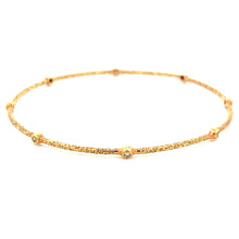 18k Rose Gold Diamond Bangle.
8 round brilliant cut diamonds totali...
