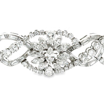 18k white gold diamond bracelet features various diamond shapes and...