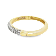 18k yellow gold bangle with pave-set diamonds totaling approximatel...