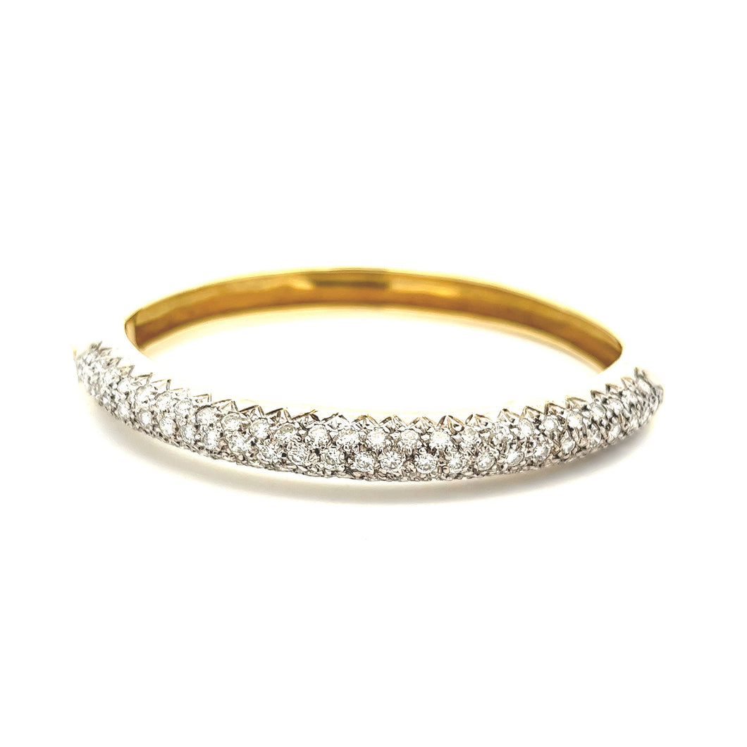 18k yellow gold bangle with pave-set diamonds totaling approximatel...