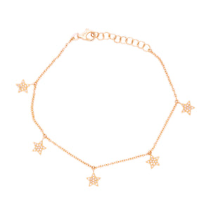 This 14k yellow gold bracelet features 5 dangling stars which are p...