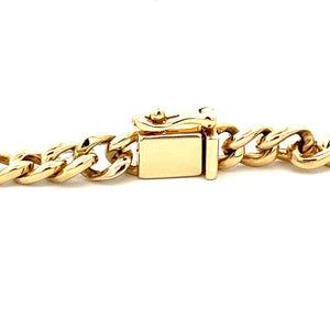 This 14k yellow gold link curb chain bracelet features pave set dia...