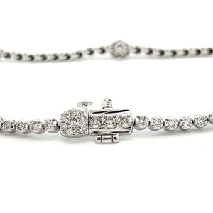 This gorgeous 14k white gold diamond bracelet features round brilli...