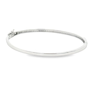 This easy to stack and style bangle features 91 pave-set round bril...