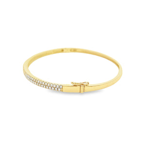 This easy to stack and style bangle features 91 pave-set round bril...