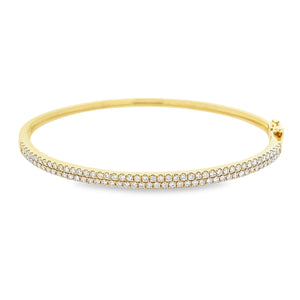 This easy to stack and style bangle features 91 pave-set round bril...