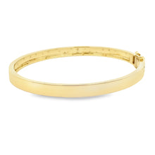 This easy to stack and style 14k yellow gold bangle features round ...