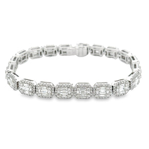This beautiful 18K white gold diamond bracelet features 100 baguett...