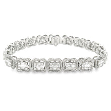 This beautiful 18K white gold diamond bracelet features 90 baguette...