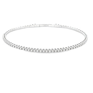 This easy to stack and style 14k white gold bangle features round b...