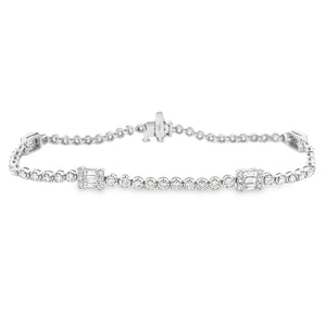 This 18k white gold diamond bracelet features round brilliant cut a...