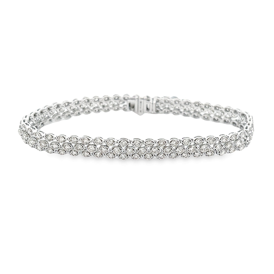 This gorgeous 14k white gold diamond bracelet features round brilli...