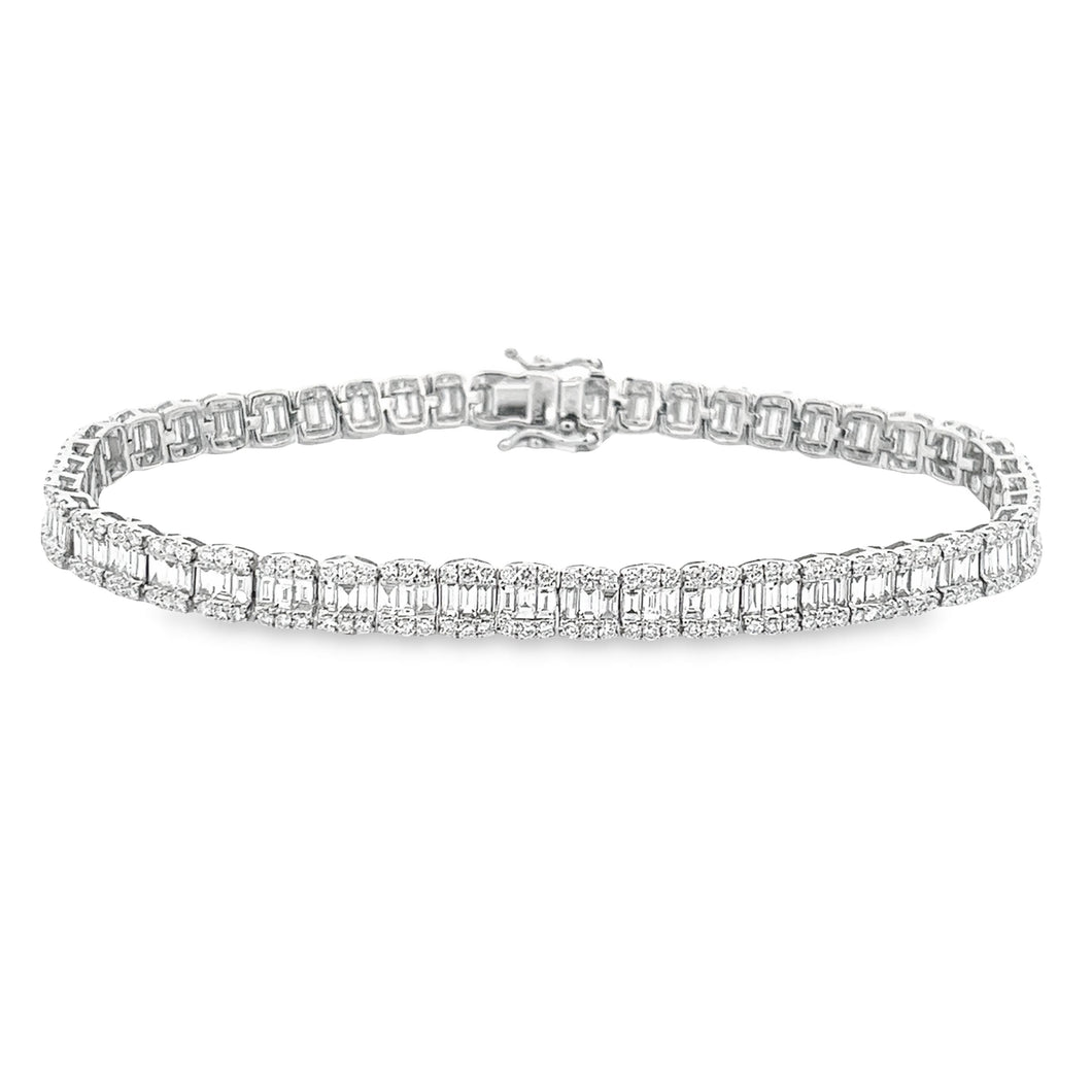 This 14k white gold diamond bracelet features baguette cut diamonds...