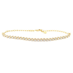 This 14k yellow gold diamond bracelet features round brilliant cut ...