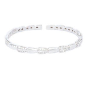 This stunning 18k white gold bangle features round brilliant cut di...