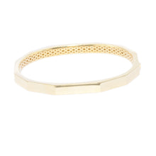This easy to stack and style 18k yellow gold bangle features round ...