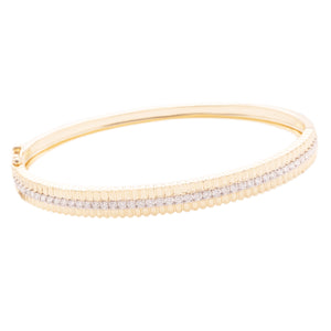 This easy to stack and style 14k yellow gold bangle features round ...