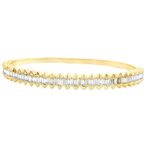This beautiful 14k yellow gold bangle features 54 baguette cut diam...